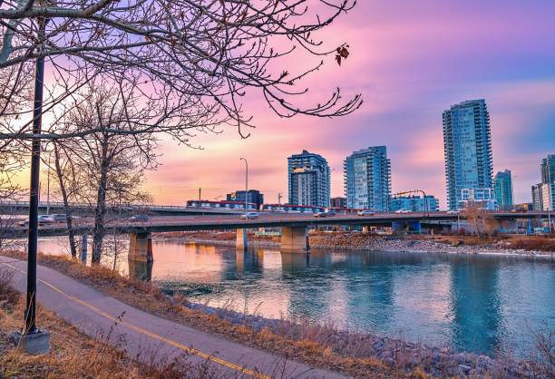 istock Sunrise Clouds Over The Bow River And Pathway 1312184289