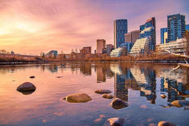 istock Calgary Skyline Reflecting Into A Park Lake 1312185108