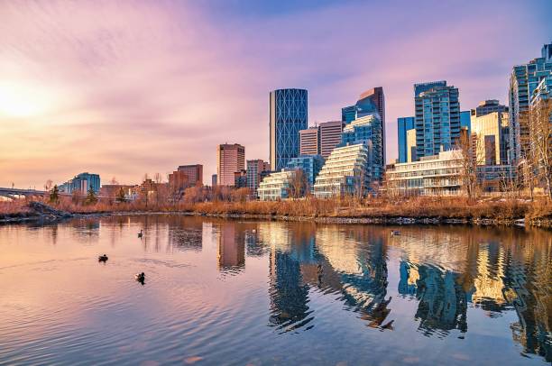 istock Calgary Skyline Reflecting Into A Park Lake 1312185153