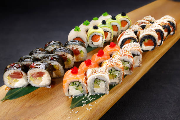 istock Seafood delicatessen Japanese maki sushi rolls set 1312185644