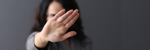 istock Woman shows negative gesture with her hand. 1312187513