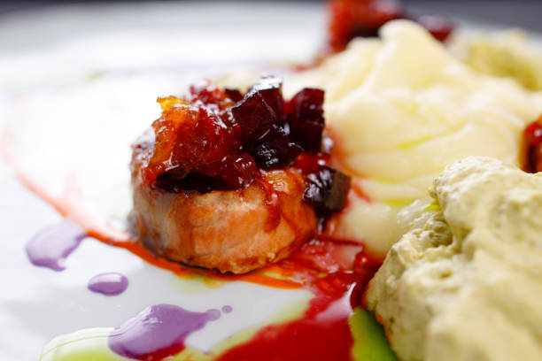 istock Salmon medallions with mashed potatoes and sauce 1312187569