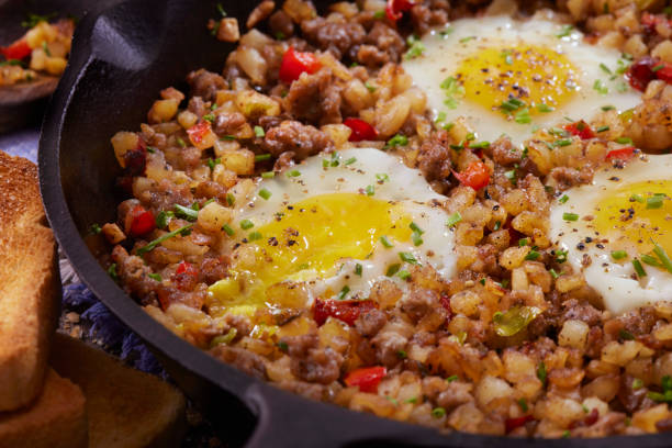istock Sausage Skillet Scramble with Hash Browns and Fried Eggs 1312188253