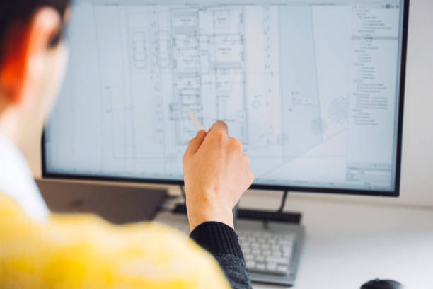 istock Man hand pointing at the computer screen with digital pen 1312189788