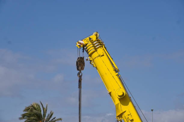 istock detail of crane working in urbanization construction 1312189975