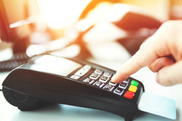 istock Paying Shopping with Credit Card PIN Entry 1312196596