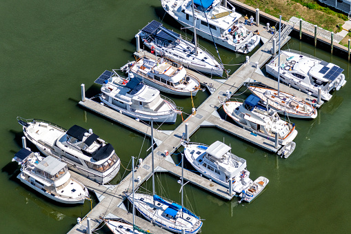 A small group of boats docked at a marina along the north Florida coast shot aerially from about 600 feet.