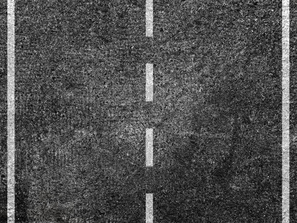 istock Asphalt road with dividing white line 1312198404