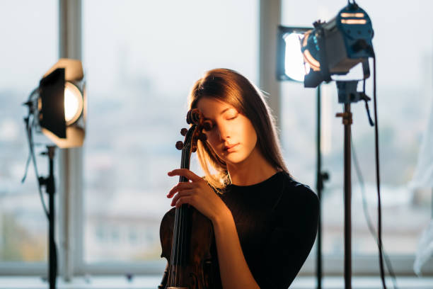 istock female violinist portrait studio shooting hobby 1312202180