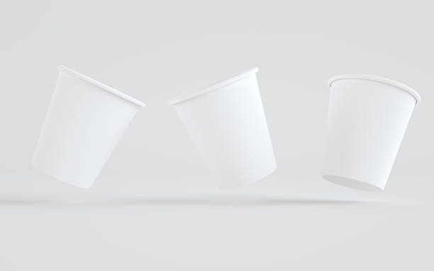 istock 8 oz. Paper Coffee Cup Mockup Without Lid - Three Floating Cups 1312202467
