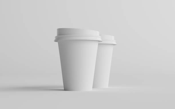 istock 12 oz. / 355ml Single Wall Paper Regular / Medium Coffee Cup Mockup with White Lid - Two Cups 1312203106