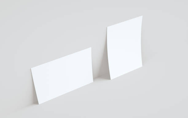 istock A5 Flyer / Brochure Mock-Up - Two Flyers Against Wall Background 1312203149