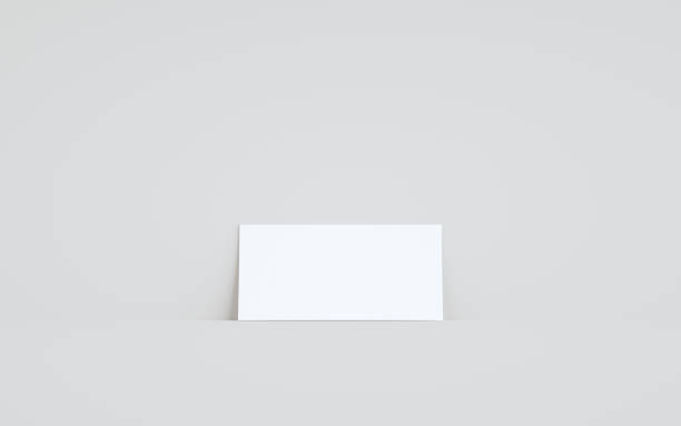 istock DL Flyer / Invitation Mock-Up - One Flyer Against Wall Background 1312203171