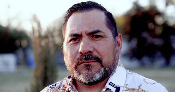 istock Serious pensive mature hispanic man looking at the camera 1312205252