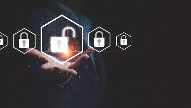 istock Businessman holding Unlock master key with lock key for access technology security information concept. 1312213833