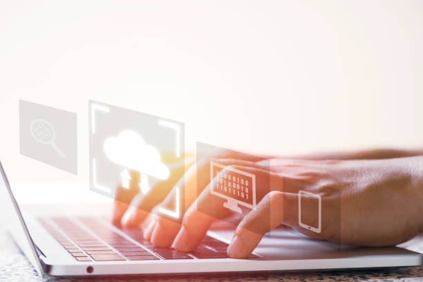 istock Virtual Cloud and technology icons , Businessman using laptop computer to control operations thru cloud computing system. 1312215459