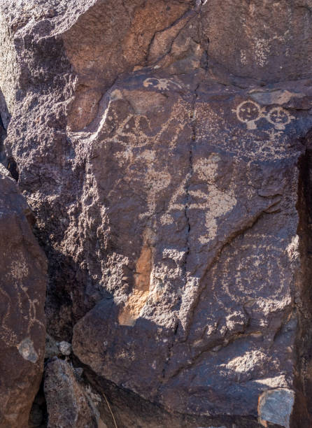 Ancient Native American Rock Art in Petroglyph National Monument Ancient Native American Rock Art in Petroglyph National Monument, Albuquerque, New Mexico albuquerque volcanoes stock pictures, royalty-free photos & images