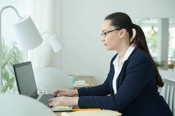 istock Female entrepreneur working on laptop 1312220337
