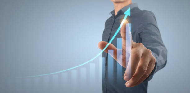 istock Businessman plan graph growth and increase of chart positive indicators 1312226968