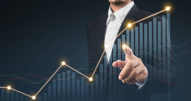 istock Businessman plan graph growth and increase of chart positive indicators 1312227226