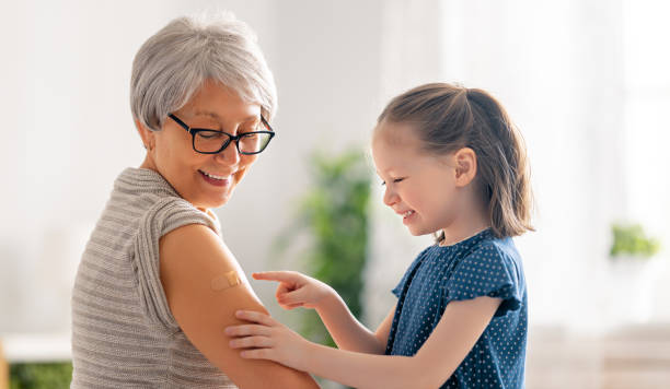istock Senior woman after vaccination. 1312228926