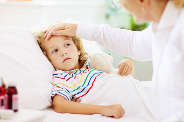 istock Sick little boy with asthma medicine. Ill child. 1312228944