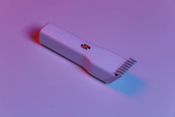 istock Hair clipper in blue-red neon light 1312233683