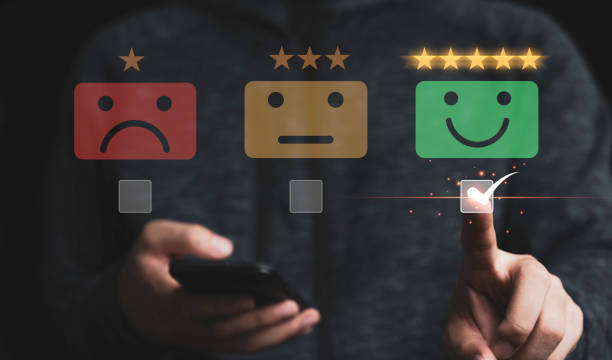 istock Businessman using mobile and touching to smiley face for customer survey product and service , Customer satisfaction and evaluation concept. 1312233684