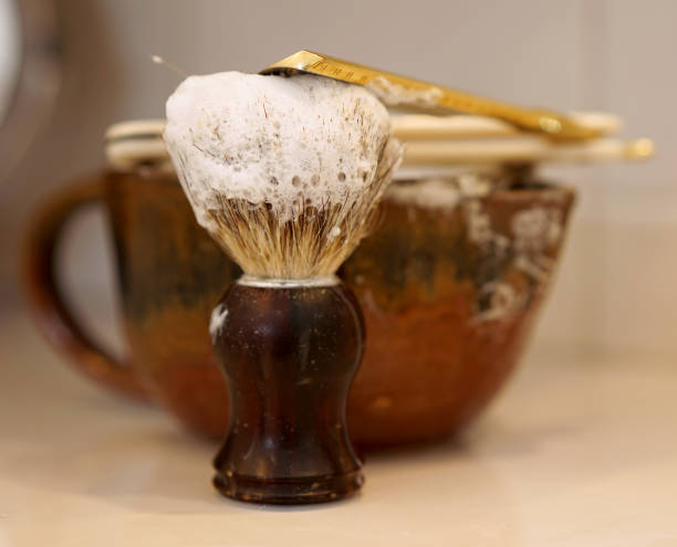 istock razor, shaving brush and foam dish in the bathroom 1312237200