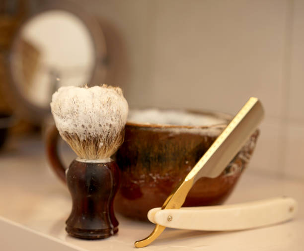 istock razor, shaving brush and foam dish in the bathroom 1312237207