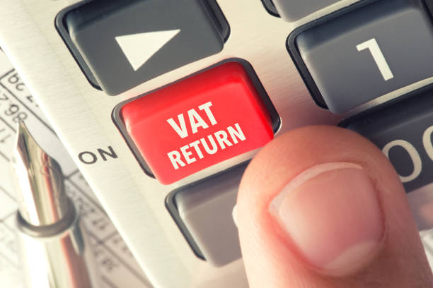 istock VAT or tax return concept with hand calculator buttons and finger pressing keyboard 1312239518