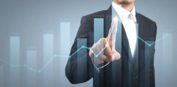 istock Businessman plan graph growth and increase of chart positive indicators 1312240682