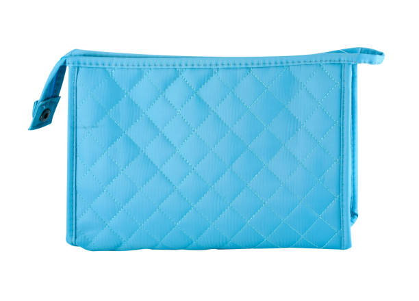 bolsa de artículos de aseo azul con cremallera - cosmetic bag fotografías e imágenes de stock