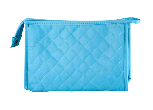 Blue make-up bag with diamond seams pattern, white background, clipping path
