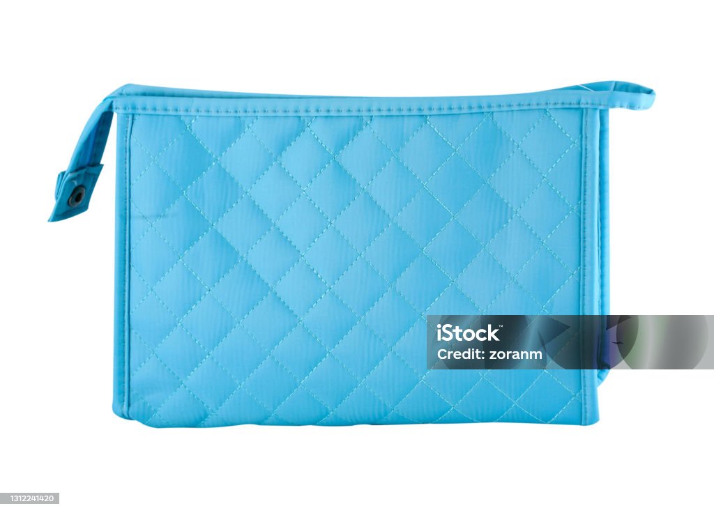 Blue toiletries bag with zipper Blue make-up bag with diamond seams pattern, white background, clipping path Make-Up Bag Stock Photo