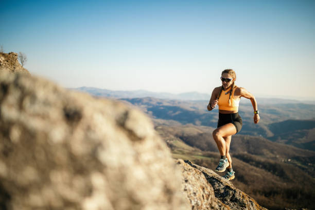 istock Woman running on mountain 1312243981