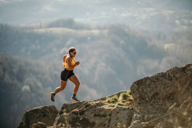 istock Woman running on mountain 1312244035
