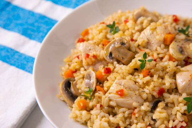 istock Traditional spanish paella tapa with chicken and vegetables. 1312246237