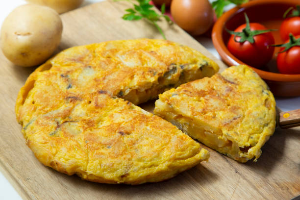istock Traditional spanish omelette with potatoes and onion. 1312246345