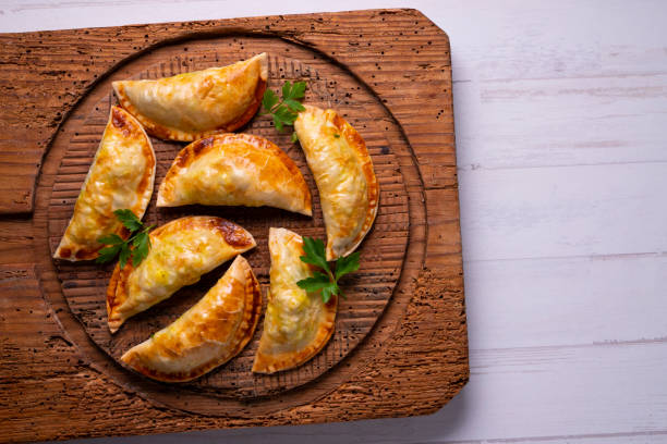 istock Argentinian empanadillas with minced meat and vegetables. 1312246354