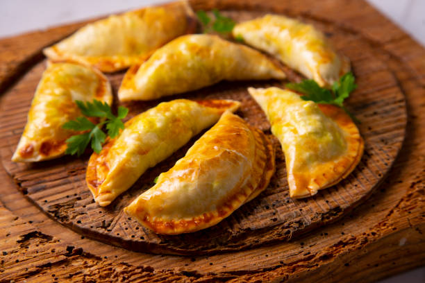 istock Argentinian empanadillas with minced meat and vegetables. 1312246360