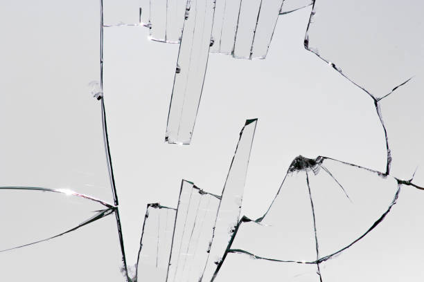 istock Pieces of broken glass, cracks on the window. 1312248741