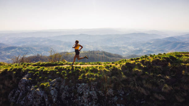 istock Woman running on mountain 1312249050