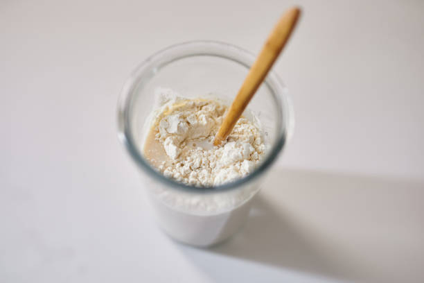 istock Mixing yeast dough starter ingredients in glass 1312249756