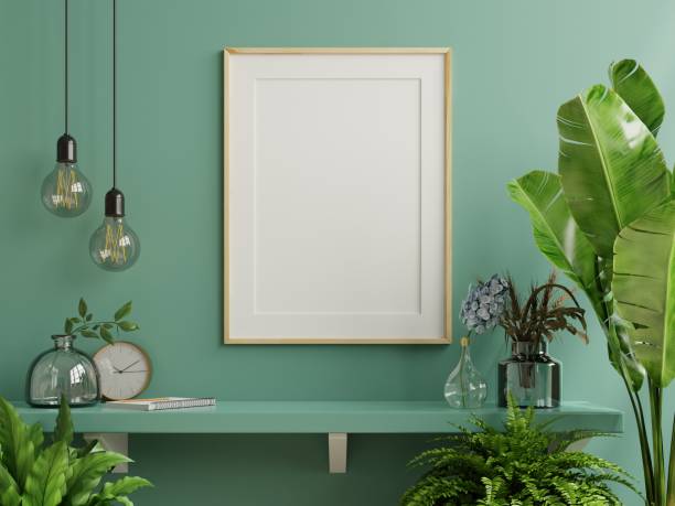 istock Mockup photo frame on the green shelf with beautiful plants. 1312249909