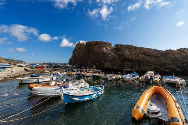 small port with many boats moored in liguria - framura village la spezia italy - rowboat nautical vessel small motorboat imagens e fotografias de stock