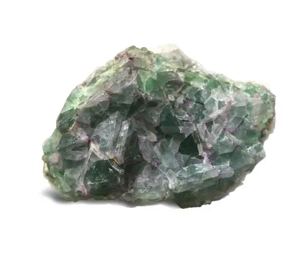 Fluorite is a multicolored mineral with overflows from saturated green and purple to gently pink.