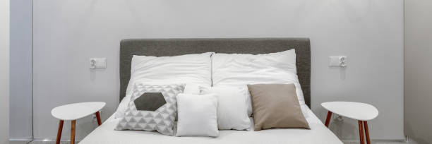 istock Double bed in modern bedroom, panorama 1312252341