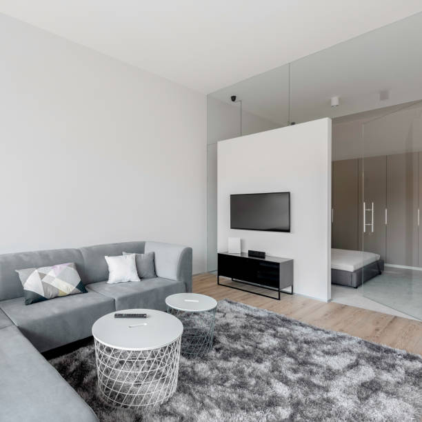 istock Comfortable corner sofa in bright living room 1312252354