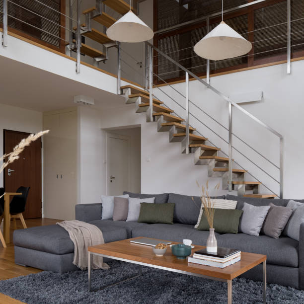 istock Living room in spacious two-story apartment 1312252437